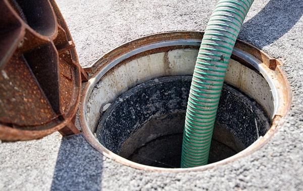 grease trap pumping includes removing built-up grease, oils, and fats from the trap to prevent obstructions in the plumbing system